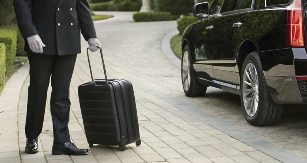 Chauffeur opening car door